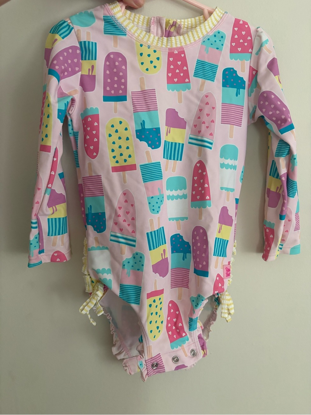 Ruffle Butts Pink Popsicle Print Long Sleeve Rashguard One-Piece
